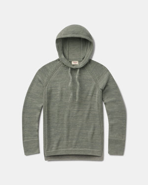 Flat lay of women’s lightweight alpaca hoodie showing hood with drawstrings, raglan sleeves and ribbed cuffs on a light gray background