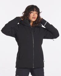 Front view of Women’s Apu Parka in black showing insulated hood, two-way zipper, and zip pockets on white background