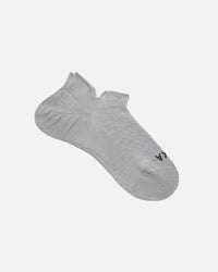 Angled view of Trail Ankle Socks showing low-cut ankle, alpaca blend knit and cushioned heel on white background