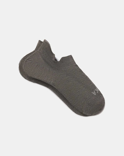 Angled view of Trail Ankle Socks showing low-cut ankle, breathable alpaca knit and cushioned heel on white background