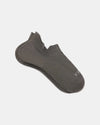 Angled view of Trail Ankle Socks showing low-cut ankle, breathable alpaca knit and cushioned heel on white background