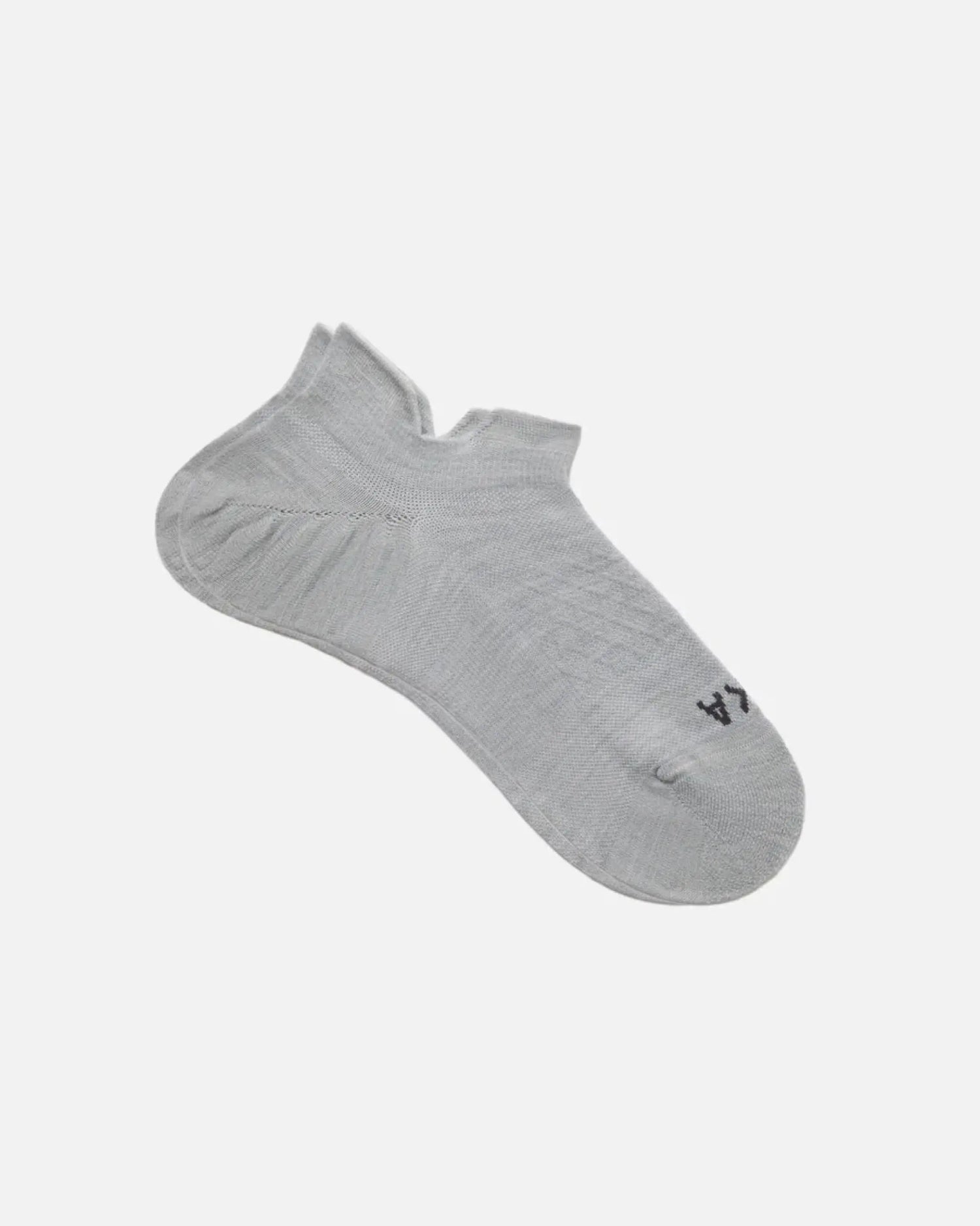 Angled view of Trail Ankle Socks showing low-cut ankle, alpaca blend knit and cushioned heel on white background