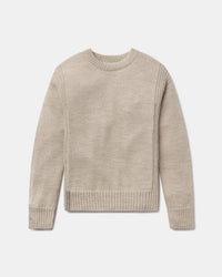 Beige sweater on a light gray background