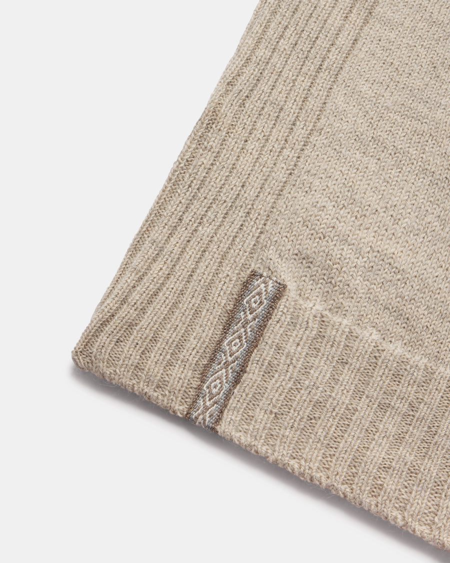 Close-up of the Women's Original crew in Pebble knit fabric with the Inca ID on a light gray background
