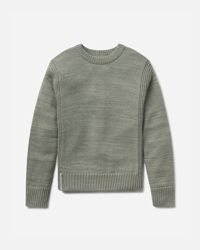 Green sweater on a light gray background