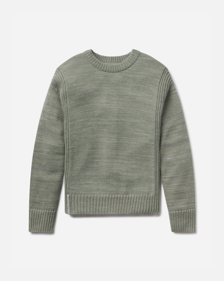 Green sweater on a light gray background