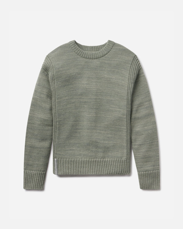 Green sweater on a light gray background