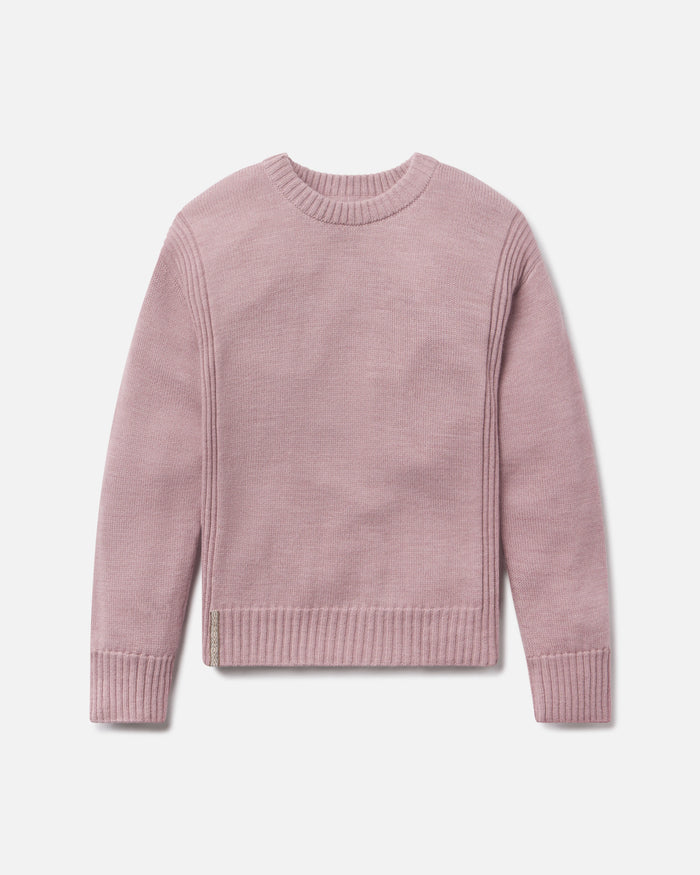 Pink sweater on a light gray background