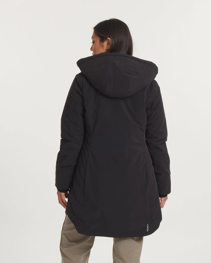 Person wearing a black coat with a hood on a white background