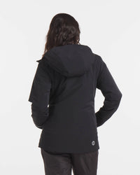 Backside of Model in Apu Women's Black Waterproof Parka Winter Ski Jacket with Natural PAKAFILL® Insulation – PAKA Apparel