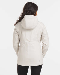 Backside of Woman in Noni / White Hooded Apu Parka for Skiing, Snowboard and Outdoors – PAKA Apparel