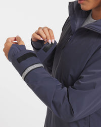 Hands Tightening Wrist Strap on Navy Blue Women's Apu Parka Waterproof Jacket – PAKA Apparel