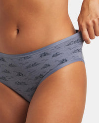 Front of Women’s Essential Printed Mid-Rise Brief showing bluestone mountain print on alpaca fabric on model