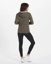 A woman wearing a Green Women's Full zip.