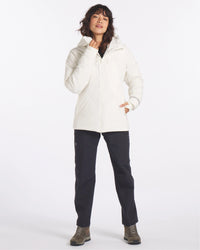 Model Standing in Apu Women’s Ivory White Parka Winter Jacket with PAKAFILL® Alpaca Insulation – PAKA Apparel
