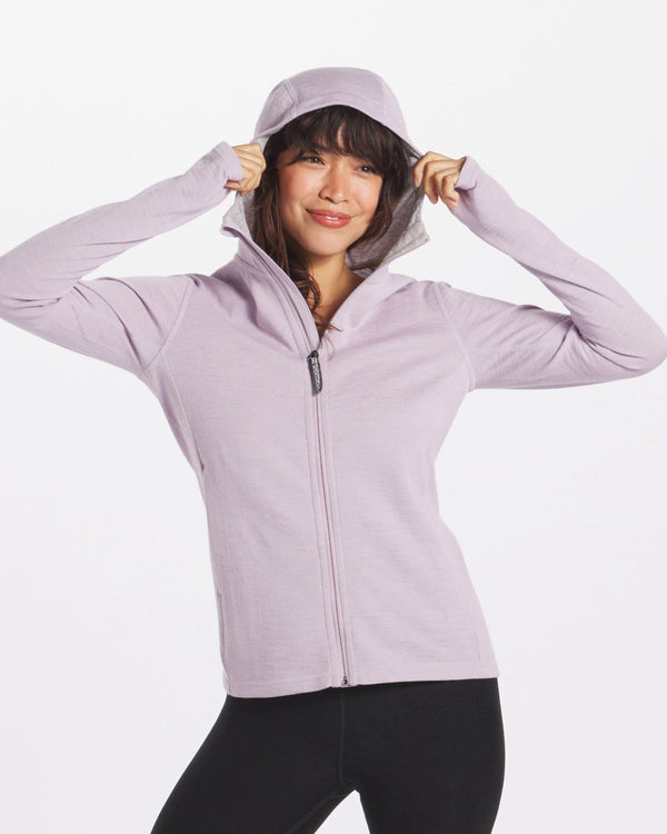 Woman Smiling Wearing Lavender / Light Purple Breathe Full-Zip Alpaca Hoodie with Hood over Head - PAKA Apparel