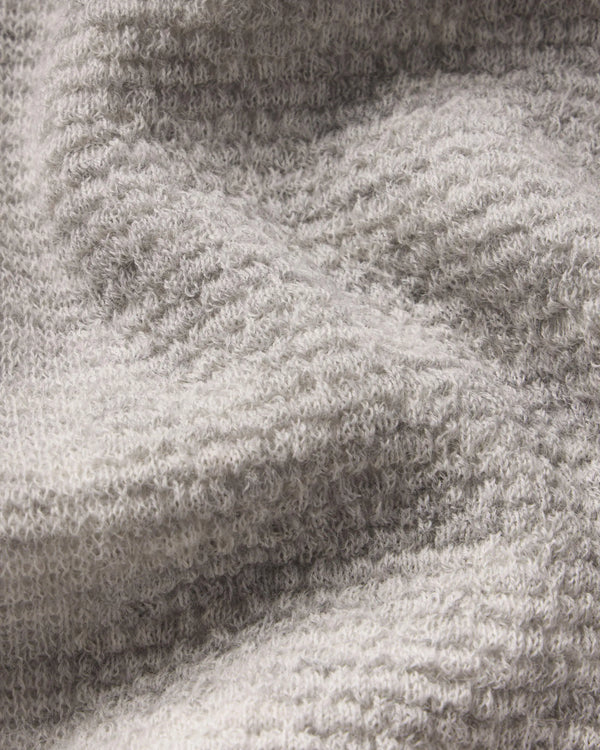 Close-up of a textured Women's Mountain Crew Sweater in Light Grey 