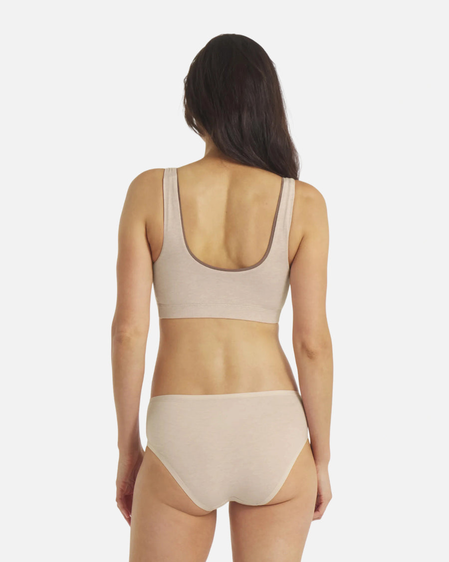 Back view of Women’s Essential Scoop Bralette in birch showing low scoop back and wide straps on light gray background