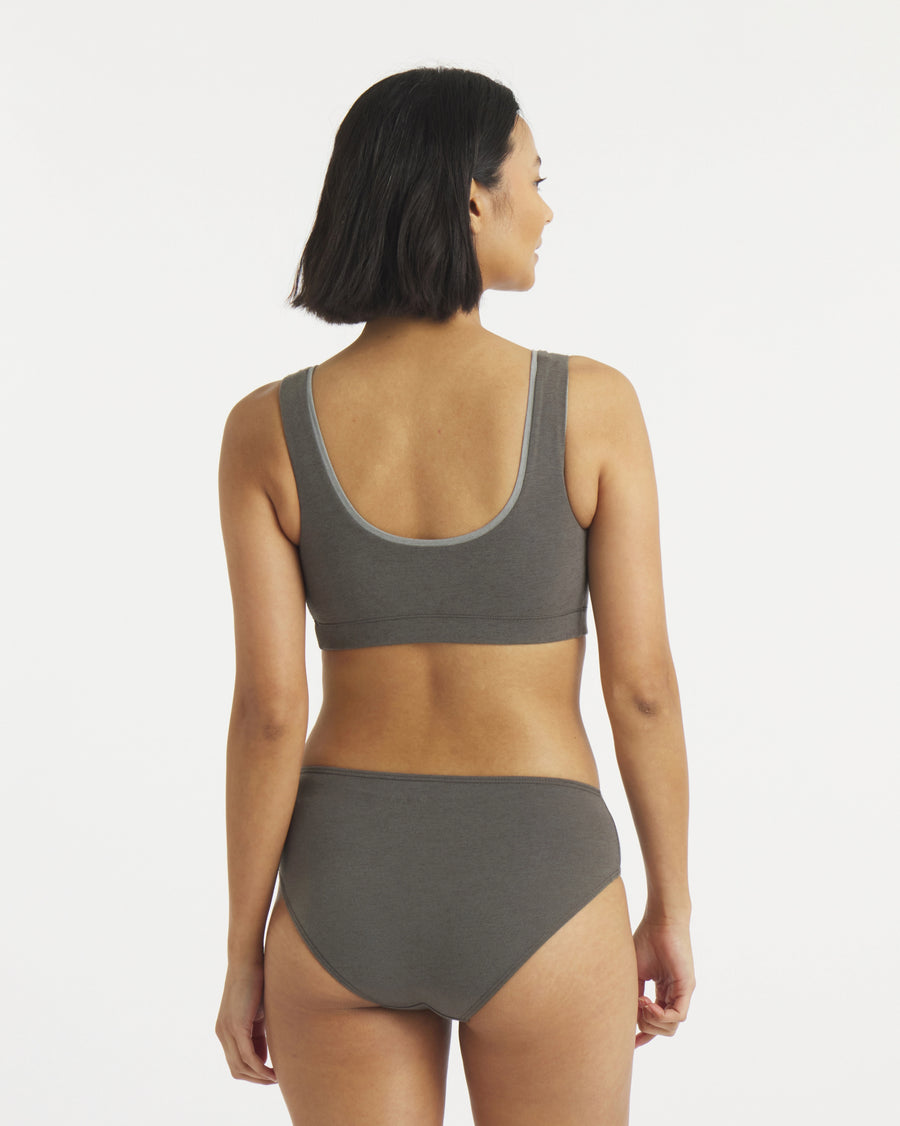 Back view of Women’s Essential Scoop Bralette in forage showing wide straps, scoop back and smooth fit on model