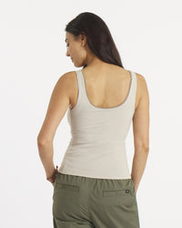 Back view of Women’s Essential Tank in birch showing scoop back, wide straps, cropped fitted torso and built-in shelf bra