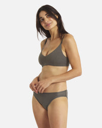 Three-quarter view of Women’s Essential Triangle Bralette (forage) on model; deep V, wireless padless fit, Inca straps