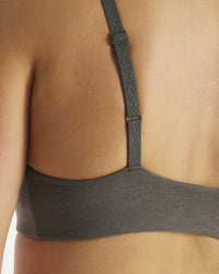 Back close-up of Women’s Essential Triangle Bralette showing adjustable strap with embossed Inca pattern and wide underband on model