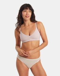 Front view of Women’s Essential Triangle Bralette, smoky lavender, deep V wireless design with embossed Inca straps on white