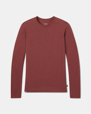 PAKA Women's Clay Aire Long Sleeve flatlay on a greyish white background