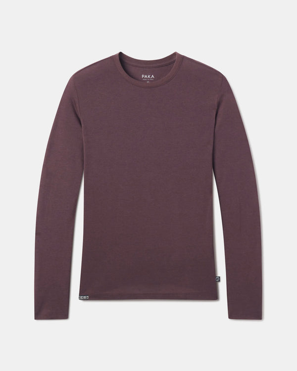 PAKA Women's AIre Long Sleeve in Fig flatlay against a white grey background