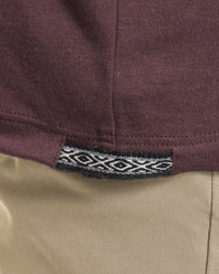 Close-Up of Inca ID on Women's Aire Alpaca Long Sleeve Shirt in Fig / Purple – PAKA Apparel