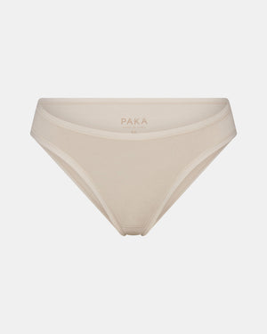 Front view of Women’s Essential Bikini Brief in Bone showing mid-rise cut, elastic trim, and interior PAKA logo on light gray background