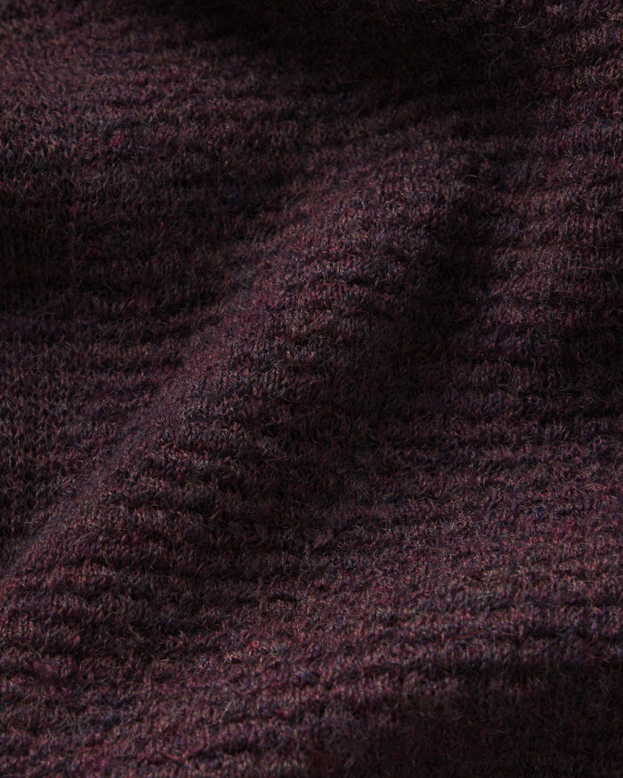Close-up of dark purple fabric texture