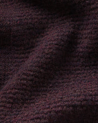 Close-up of dark purple fabric texture
