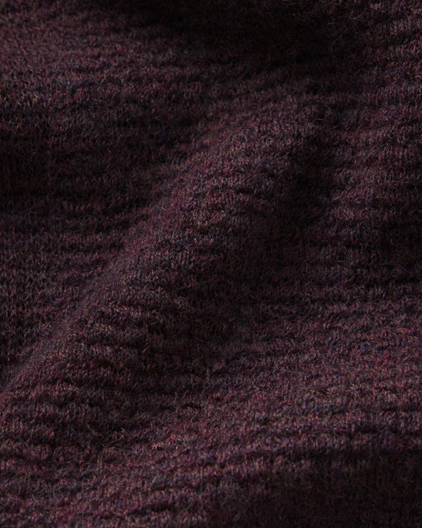 Close-up of dark purple fabric texture