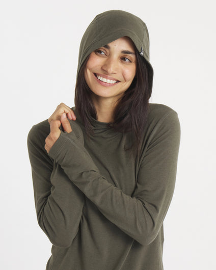 Model Smiling with Hood Up on Andean Moss / Dark Green Sol Women's Lightweight Sun Hoodie – PAKA Apparel