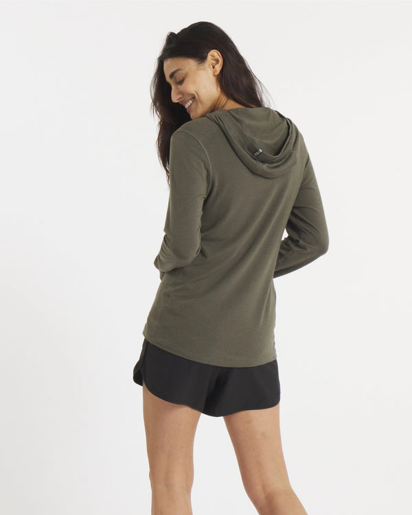 Back of Model in Sol Women's Sun Hoodie for Outdoors in Andean Moss / Dark Green – PAKA Apparel