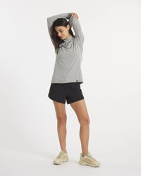 Model with Arms Overhead in Sol Heather Grey Women's UPF Sun Protection Hoodie – PAKA Apparel