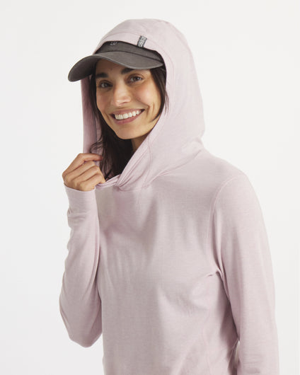 Model Smiling in Sol Women's Lightweight and Breathable Sun Hoodie in Lilac / Light Pink – PAKA Apparel