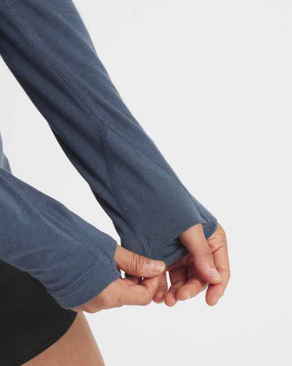 Hands Through Thumbholes of Sol Navy Women's Alpaca and Tencel Sun Hoodie – PAKA Apparel