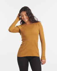 Woman Smiling with Hand Over Ear in Golden Brown Alpaca Wool Thermal Baselayer Shirt for Winter – PAKA Apparel