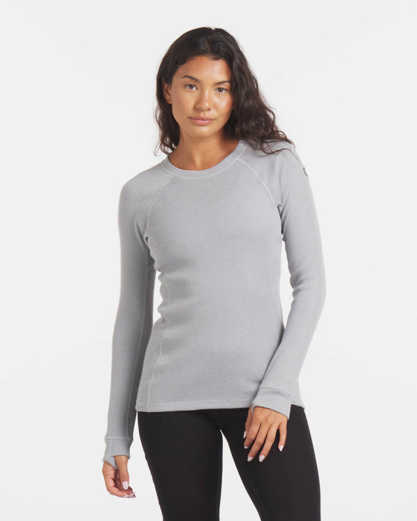Woman Wearing Silver / Light Greens y Alpaca Wool Thermal Baselayer Shirt for Skiing, Snowboarding and Winter – PAKA Apparel