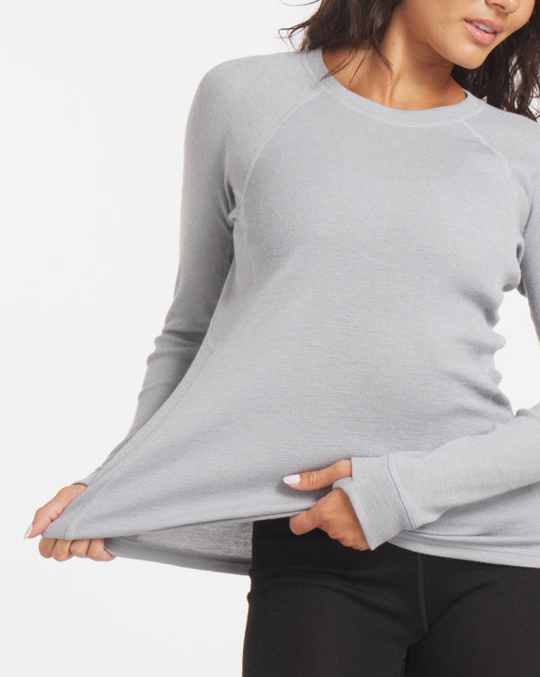 Woman Stretching Waist of Silver / Light Grey Alpaca Wool Thermal Long Underwear Top – PAKA Apparel