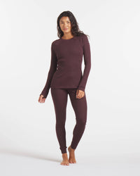 Full Height Shot of Woman in Uva / Dark Purple Alpaca Wool Thermal Baselayer Shirt for Skiing, Snowboarding and Winter – PAKA Apparel