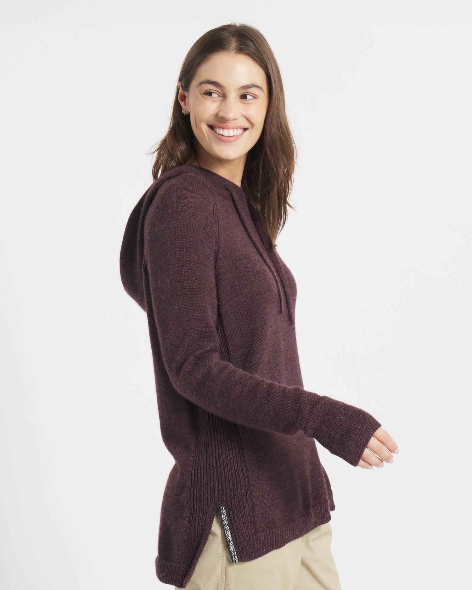 Model Looking to Side in the Women's Hoodie, an Alpaca Hooded Sweater in Fig / Burgundy – PAKA Apparel