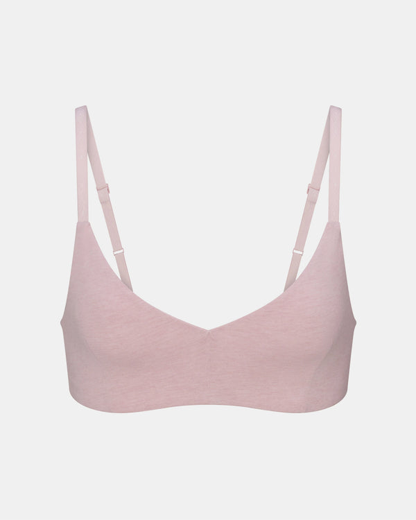 Pink bralette on a light gray background