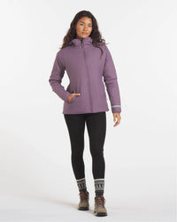 Full-Height Shot of Model Wearing Women's Apu Lightweight Puffer in Amethyst Purple – PAKA Apparel