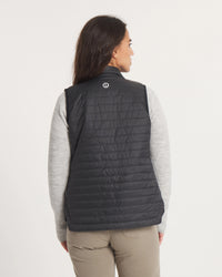 Back of Model Wearing Mayu Ultralight Packable Puffer Vest in Black – PAKA Apparel