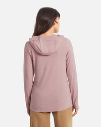 Back view of Women’s Sol Hoodie in Woodrose on model showing three-panel hood and long sleeves on white background