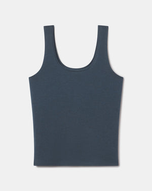 Front view of Women’s Essential Tank showcasing scoop neckline and wide straps on light gray background