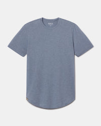 Front view of Women’s Essential Tee in bluestone, crewneck short-sleeve with curved hem on light gray background